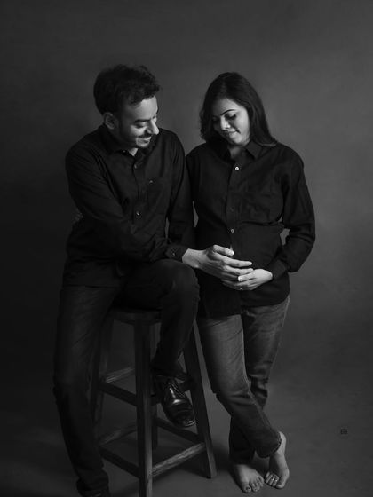 A candid black and white portrait of a couple sharing a quiet moment. This style is perfect for capturing genuine, unposed interactions.