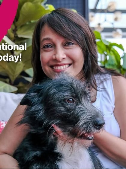 A photo of me with my own dog, celebrating International Dog Day. They truly make every day brighter.