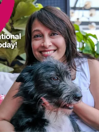 A photo of me with my own dog, celebrating International Dog Day. They truly make every day brighter.