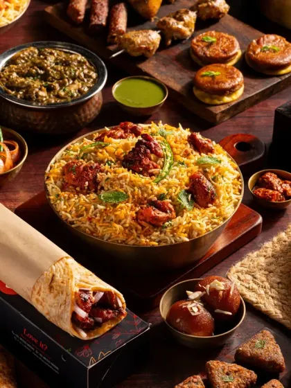 Shooting for delivery platforms requires a unique approach. This expansive flat lay for Charcoal Eats showcases a full menu of biryani, kebabs, and curries, composed to look abundant and appealing on a small screen for apps like Zomato and Swiggy.
