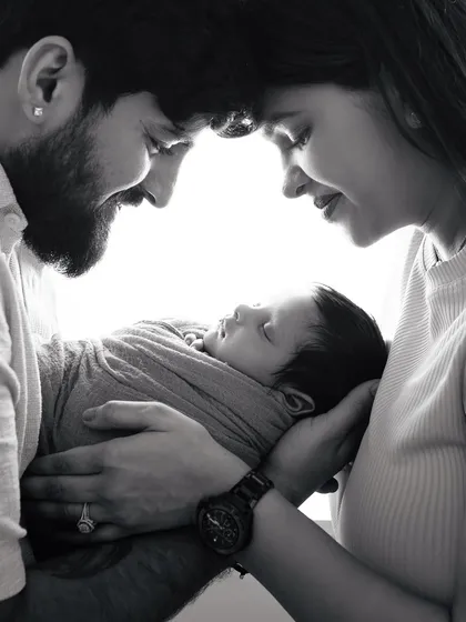 The emotions these little details hold are unparalleled. A black and white version of the classic parent and newborn portrait.