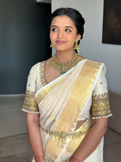Look straight out of Chennai Express. For this South Indian bridal look, we went for glowing skin, traditional gold jewelry, and eyes that could give Meenamma competition.
