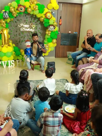 Performing my puppet show at an intimate birthday party celebration. The kids are completely engaged.