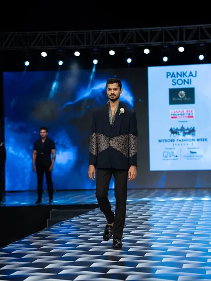 In motion on the runway for Pankaj Soni. Capturing the flow and fit of the garment is key for the audience and photographers.