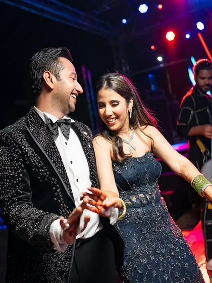 Dancing the night away. The bride's gown was not only stunning but also comfortable enough to let her enjoy every moment on the dance floor, a key consideration in our styling process.