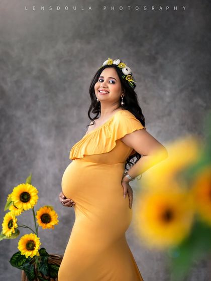 Glowing brighter than sunflowers. This cheerful studio setup with a yellow gown and floral props is perfect for celebrating your sunshine.