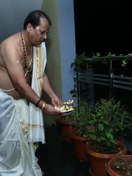 My practice is built on a foundation of daily spiritual discipline and faith. Here you can see me performing a traditional puja for the sacred Tulasi plant during a full moon, a ritual that cultivates positive vibrations and peace.