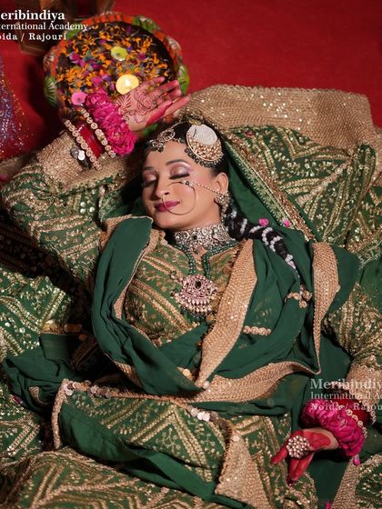 An artistic pose showing the bride resting. This highlights the longevity of the makeup, looking fresh even after a long day.