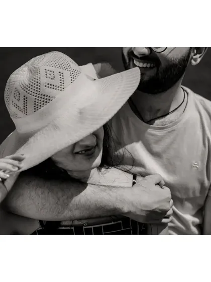 A beautiful black and white close-up that focuses purely on the emotion and joy between the couple. Sometimes, removing color makes the moment even more powerful.