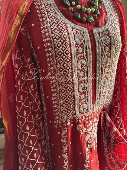 A close-up of the yoke, offering a clear look at the floral and geometric patterns created with expert Chikankari and embellishments.