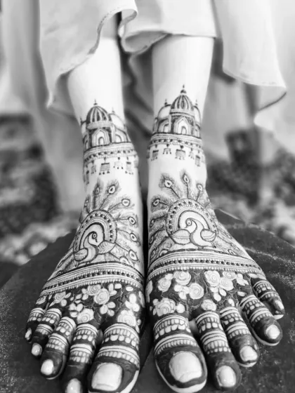 A black and white photo of the peacock and temple feet design, highlighting the beautiful contrast and symmetry.