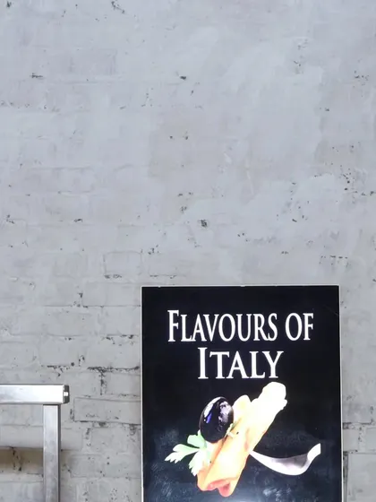 A sign for our "Flavours of Italy" station. I offer themed counters that take your guests on a culinary journey, perfect for adding variety to corporate events or weddings.