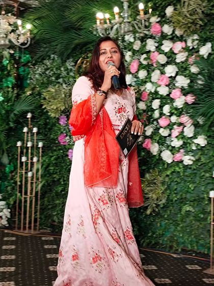 In my element, on stage with a mic in my hand. This is where I feel most alive, connecting with the audience and creating magical moments.