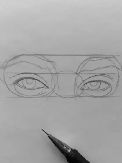 Step-by-step guide to drawing eyes, starting with the basic shapes and alignment.