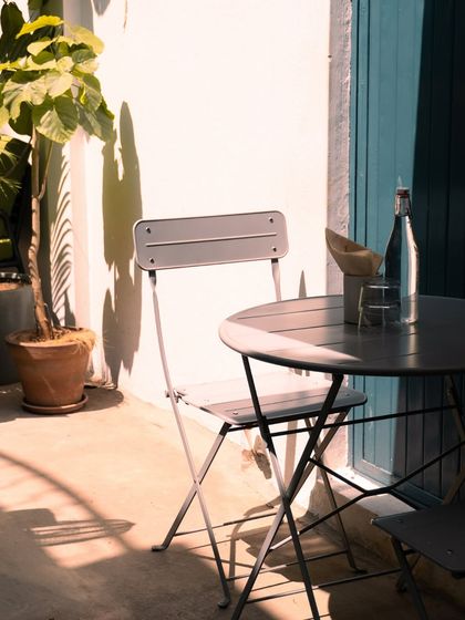 This is our favorite little outdoor corner, with the perfect balance of sunlight and shade. It is an ideal spot for reading, journaling, or having a long, honest conversation.