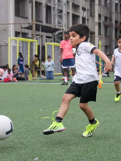 Perfecting shooting form is crucial. This young athlete practices his striking technique, focusing on body position and follow-through to generate power and accuracy.