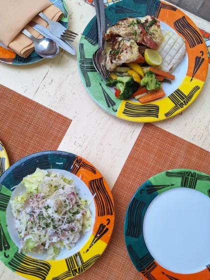 A colorful lunch spread at Yellow Brick Road. The vibrant plates add a cheerful touch to the dining experience.