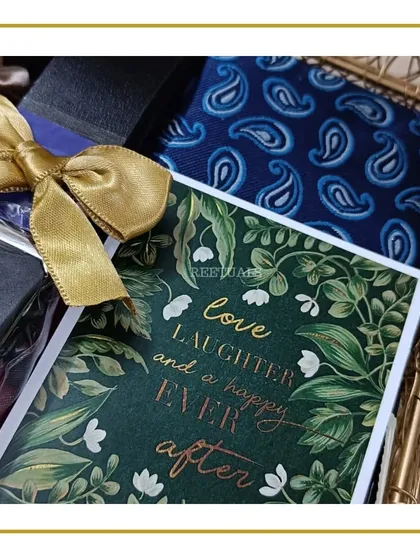 A "Love, Laughter and a happy ever after" card, a perfect sentiment to include in any wedding or anniversary gift.