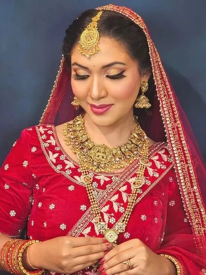 A serene pose of the bride, showcasing the soft glam makeup with a focus on radiant skin and a subtle lip color.