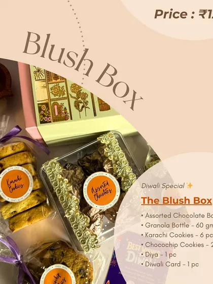 An informational graphic for the 'Blush Box' hamper, detailing the contents which include an assorted chocolate box, granola, Karachi cookies, and choco-chip cookies.
