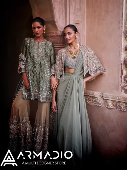 A sharara set and a draped saree from Jayanti Reddy. These signature looks showcase the designer's mastery of silhouette and embellishment, available exclusively at our store.