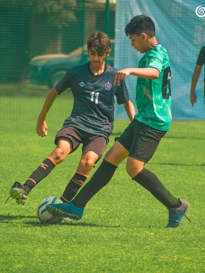 An intense one-on-one duel between two players during a competitive game.