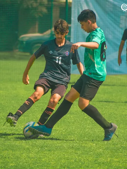 An intense one-on-one duel between two players during a competitive game.