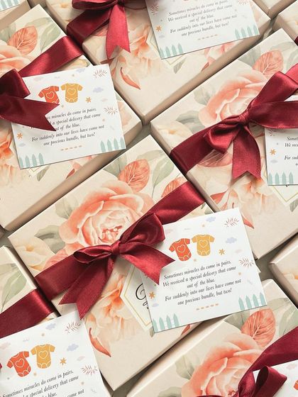 Sometimes miracles come in pairs. We created these beautiful gift boxes with custom tags to celebrate the arrival of twins, a sweet way to share the happy news.