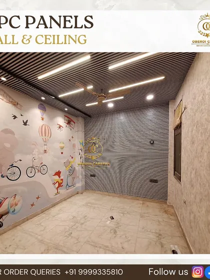 We created this fun and safe kids' bedroom using a combination of our products. The ceiling features our modern WPC panels, while the wall is covered with a non-toxic, custom-printed wallpaper to match the room's playful theme.