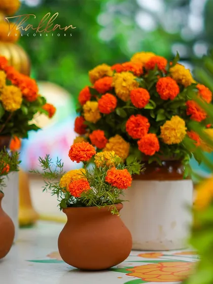 Close-up of the fresh marigold arrangements used in our traditional Haldi decor. I believe in using high-quality flowers to create a rich and authentic look.