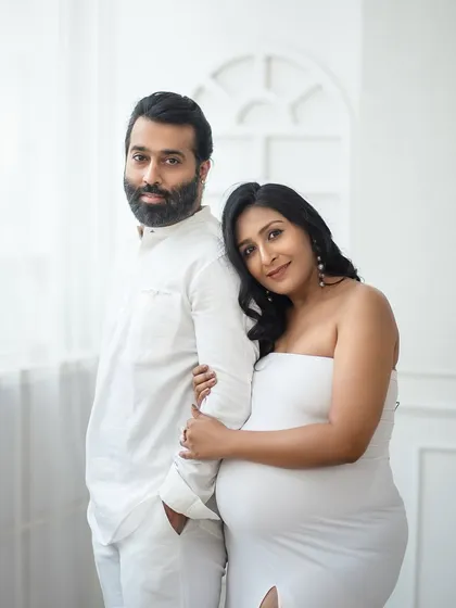 The quiet strength and connection between partners is a beautiful story to tell. This pose is all about serene togetherness.