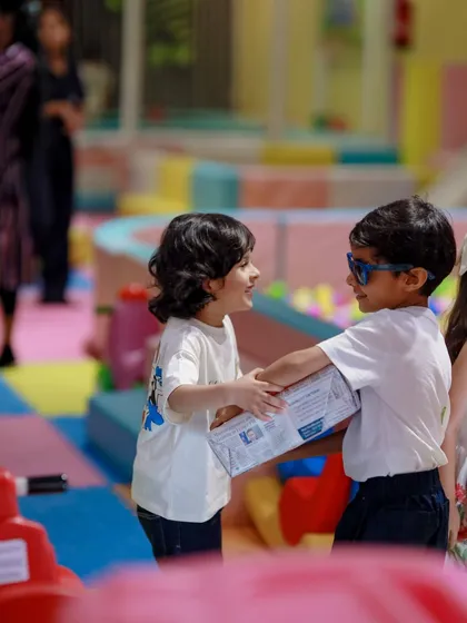 Sharing is caring, even at a Batman party. Kids learn valuable social skills while celebrating and playing together.