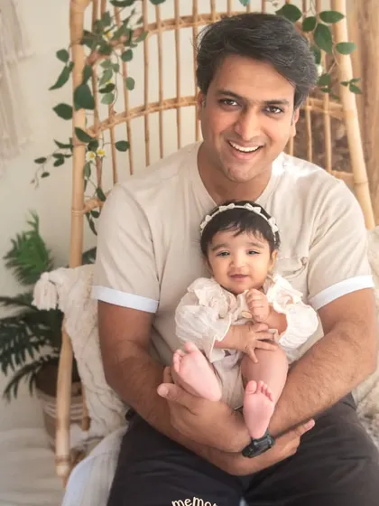 A proud papa with his sweet baby girl. The smiles say it all. Including dad in the photoshoot is so important for capturing the whole family's love story.