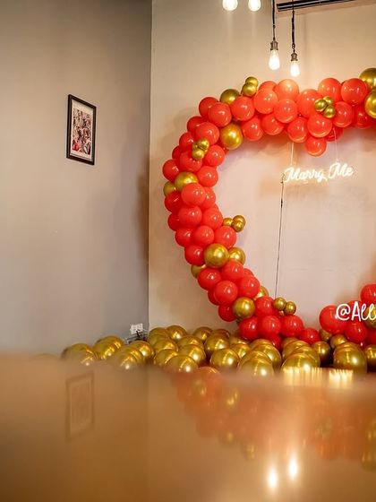 A wide shot showing how we can transform a simple corner in a cafe into a grand and romantic proposal spot.