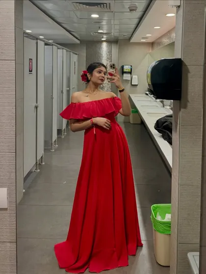 The one where I played Señorita. This stunning off-the-shoulder red gown was perfect for a night of drama and elegance.