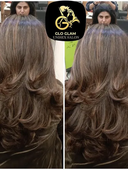 This is a perfect example of how the right hair colour and styling can transform your look. I created these soft, layered curls with subtle highlights to add dimension and movement, resulting in a fresh and modern style.
