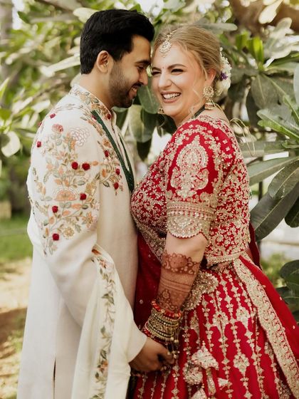 A happy, candid portrait of a couple sharing a laugh. Their genuine joy is what makes this photo so special.