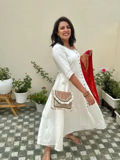 A full-length shot showing the complete, comfortable, and chic outfit.