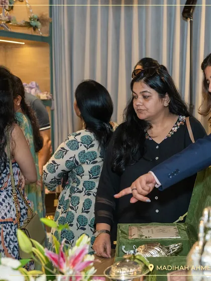A moment of consultation at our Ahmedabad launch event. We work closely with clients to understand their needs and help them curate the perfect bespoke gift.