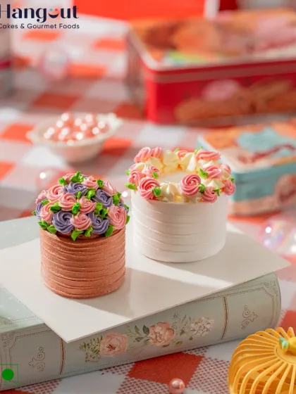 Minimal size, maximum elegance. Our micro mini cakes in Dutch Truffle and Strawberry are reimagined with delicate floral finesse, perfect for a sophisticated little treat.