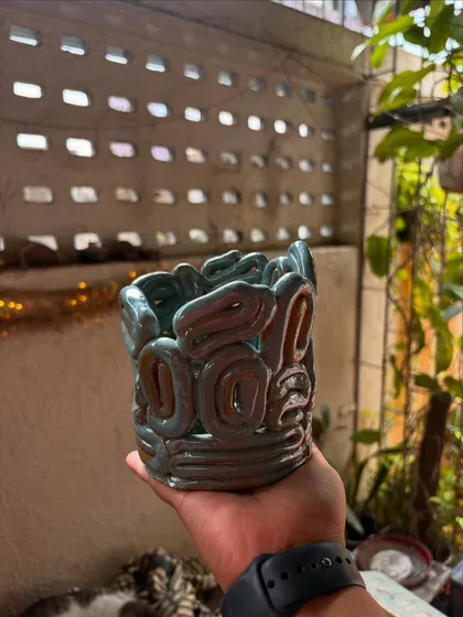 I loved teaching this student, who focused on enjoying the process rather than chasing perfection. That's why her work, from the Nerikomi tray to the quirky green face vase, turned out so beautiful and full of joy.