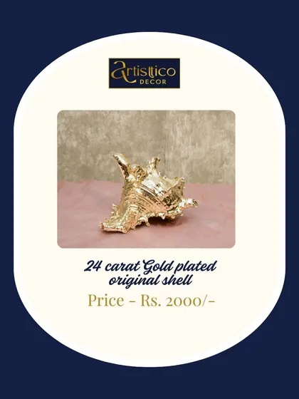 This is a 24-carat gold-plated original shell, a unique and luxurious decor piece. It's a perfect accent for a coastal-themed event or as a standout item on a display shelf.