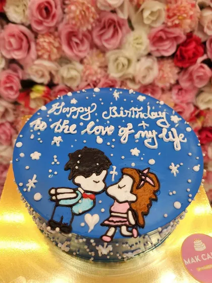 A hand-drawn cake telling a love story. This custom design features a cute cartoon couple, perfect for a birthday or anniversary. I can create similar semi-customized drawing cakes starting from just 600 rupees.