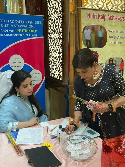 Our team at a dandiya festival exhibition, offering diet consultations and connecting with the community.