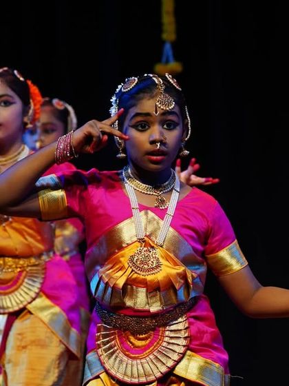 The intensity and focus in this student's eyes show her deep connection to the story she is telling through dance. This is the essence of Abhinaya.