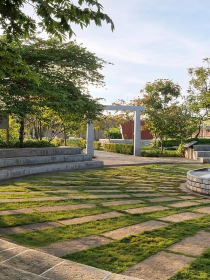 The outdoor amphitheater and science park at the H.N. Science Center. This space was designed for public engagement, using local stone for seating and creating a durable, low-maintenance landscape.