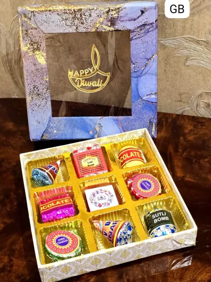 A sweet treat for the festival of lights. This "Happy Diwali" box is filled with an assortment of nine custom-wrapped chocolates, perfect for sharing with family and friends.