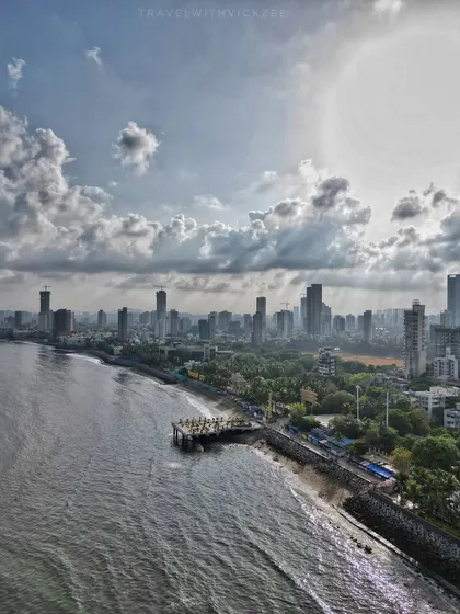 This shot captures the meeting point of Mumbai's coastline and its ever-growing skyline, centered on the Dadar Chowpatty viewing deck. It demonstrates how I blend natural landscapes with urban development, providing a panoramic context that is perfect for tourism, city planning, and commercial projects.