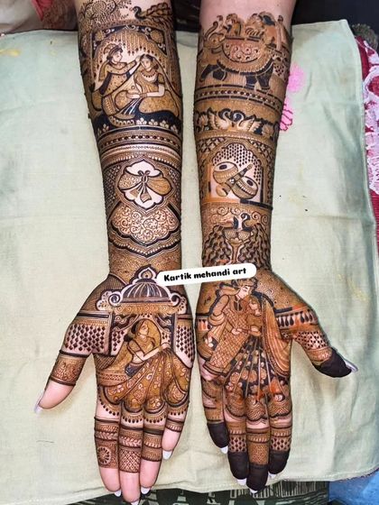 This intricate design features a bride in her doli on one palm and a couple exchanging varmala on the other. The forearms are adorned with scenes of musicians and dancing.