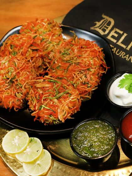 Craving kebabs? These are our noodle-wrapped kebabs, a unique and crispy starter served with a trio of dips.